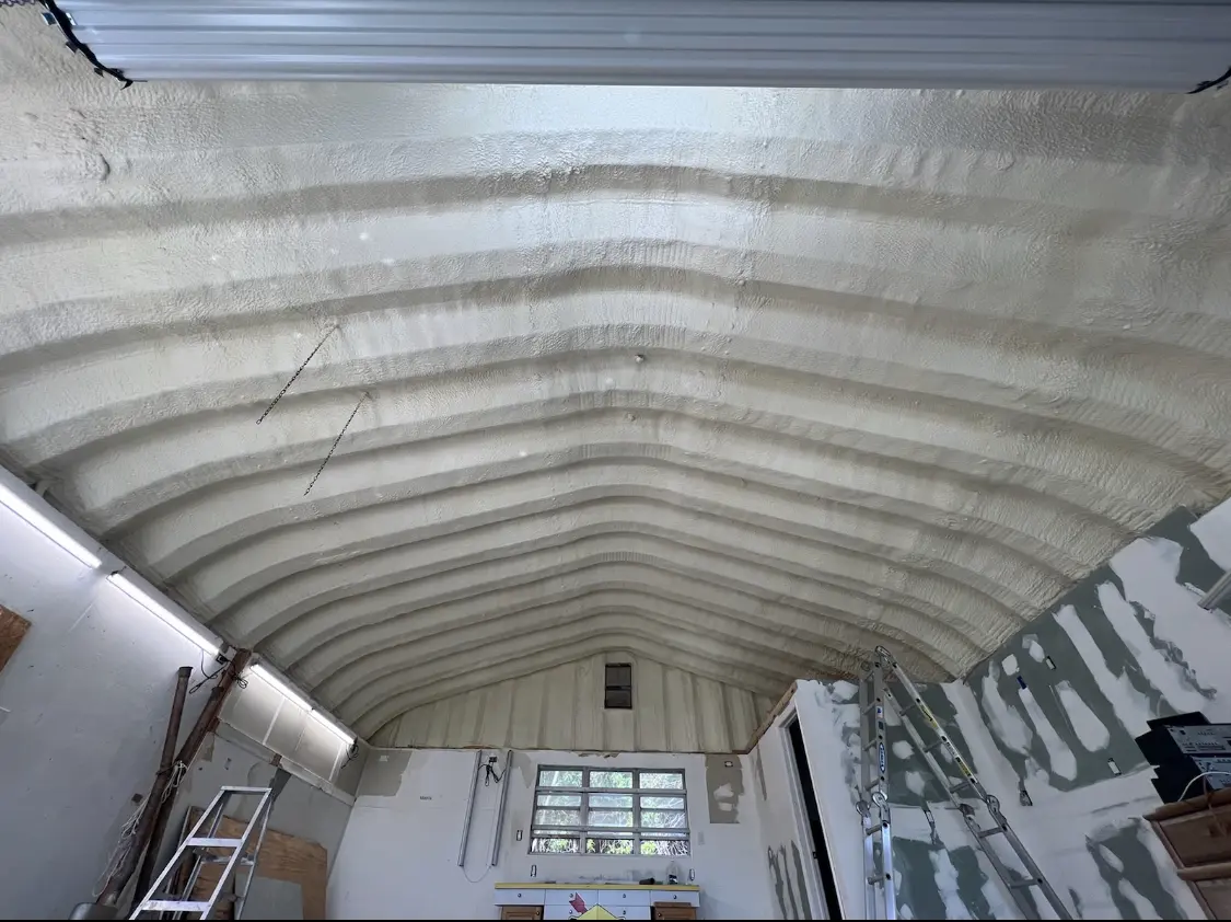 Spray polyurethane foam applied to the underside of a metal roof deck in Mendham